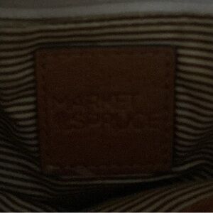 Market and Spruce tan handbag